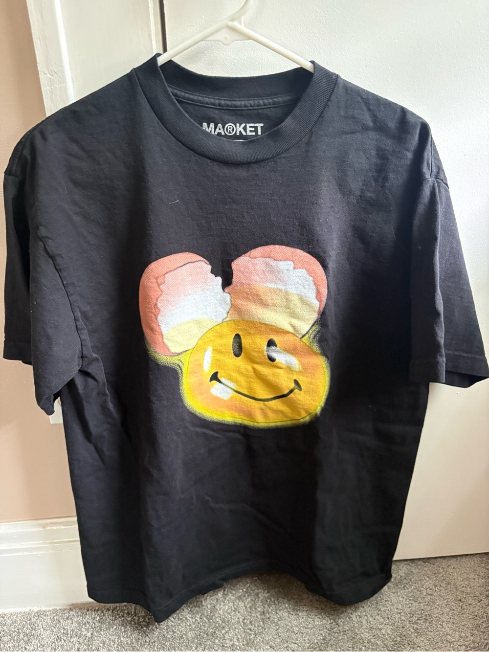 Arket Black Tee with Yellow Smiley and Pink Cream Ear Graphic